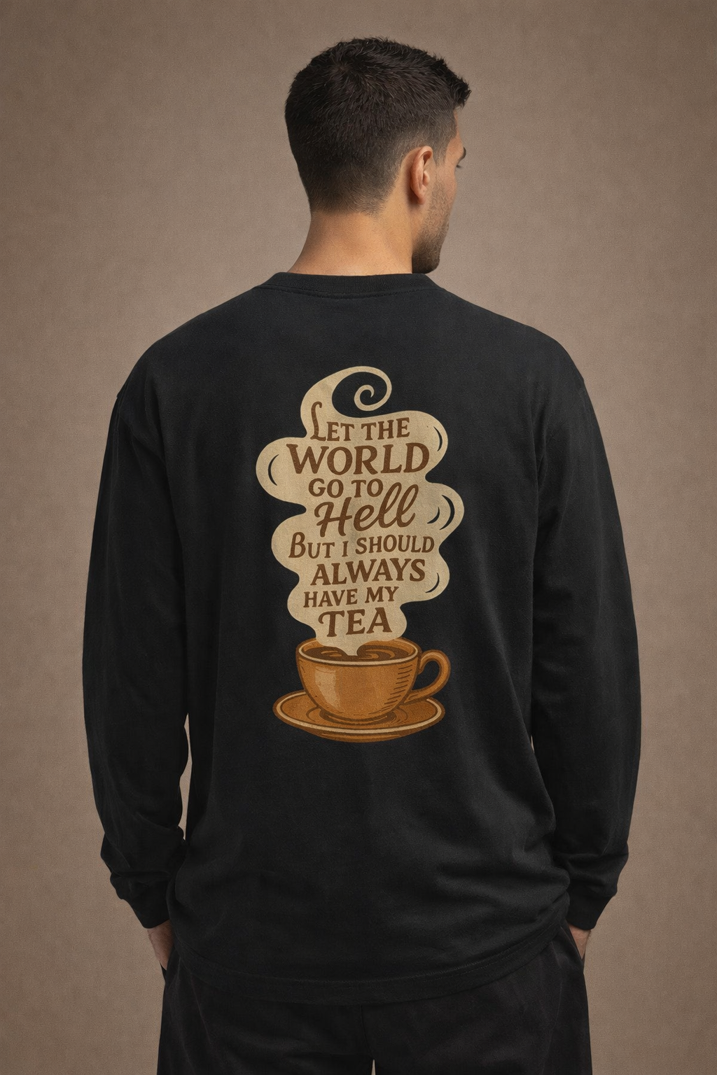 Person wearing a black long-sleeve shirt with a humorous tea-themed design on the back.